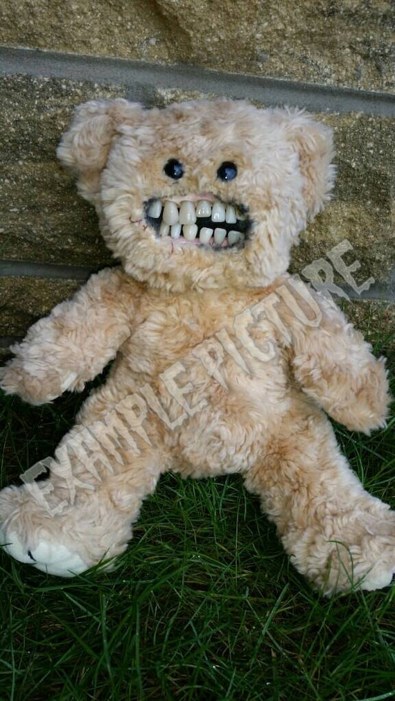 teddy bear with human teeth