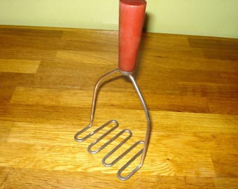 Stainless Steel Potato Masher with Red Bakelite Handle