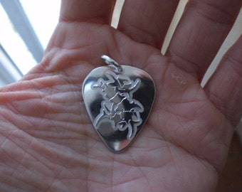 Sepultura pick silver pendant