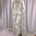 Metallic silver/white floral design embroidery and hand beaded with beaded and shiny sequins on a mesh lace-dresses-fashion-sold by the yard