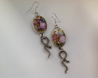 silver color, a dangle earrings