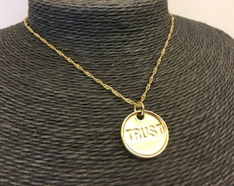 Gold plated circle trust necklace circle