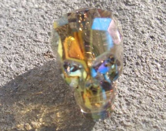 Swarovski-5750-skull bead-crystal Iridescent Green (001IridGr)-13mm