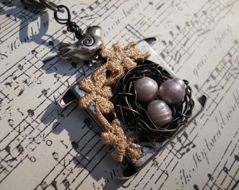 Woodland Birdnest in vintage watch case with lace necklace