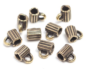 Antique brass findings Bails set brass 10 pieces. Herb, plant, stripe, stripped, 2.3mm cord L3145. Designed and made by Anna Bronze