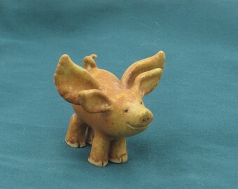 Golden Brown Flying Piggy made of clay