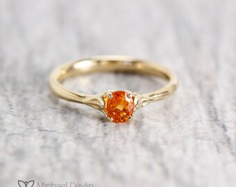 orange sapphire soliatre ring
