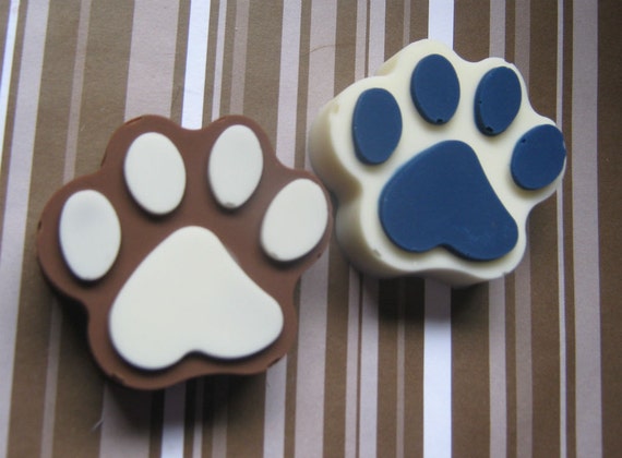 One dozen solid chocolate paw print candy pieces party favors