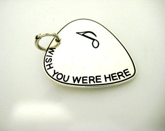 guitar pick pendant in silver