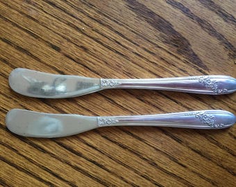 silver butter knives 5 1/2" long