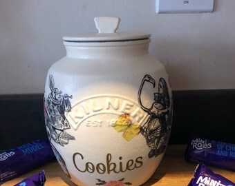 Alice in wonderland and the mad hatter cookie jar