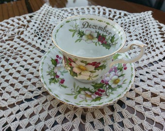 Vintage 1970's Royal Albert teacup and saucer flower of the month series, Christmas Rose, made in England.