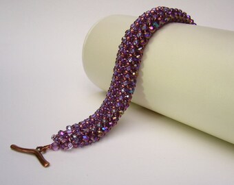 Bracelet with sparkling beads amethyst-and copper colored