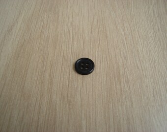 Black rim round plastic button
