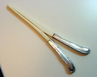 antique glove stretcher with silver handles