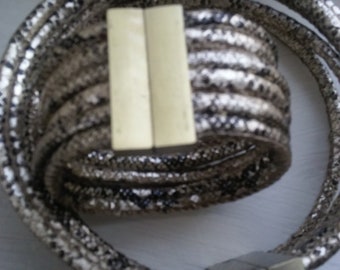 Metallic, magnetic faux snake cord cuff