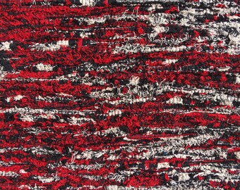 Hand woven reclaimed wool mat with blended cotton edging