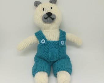 White bear in blue overalls