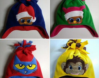 Fleece hat with ear flaps and embroidered peeker. Child size.