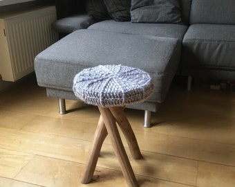 Wooden stool with crocheted seat