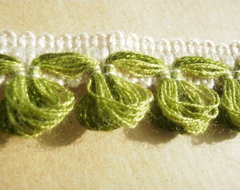 Braid has fringes "loops", acrylic, ecru and green color, width 23 mm