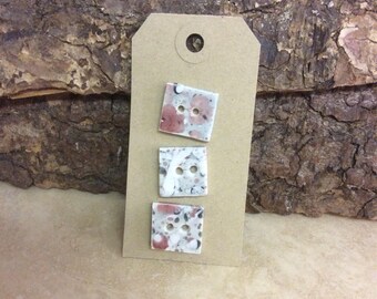 Set of three handmade ceramic buttons