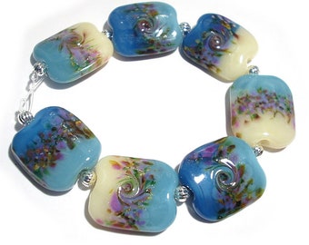 SRA Handmade Glass Lampwork Beads, Blue Florals Squeezed