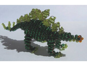 Miniature Stegosaurus in seed beads and copper wire