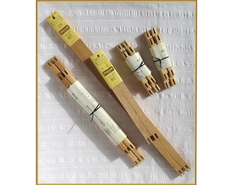 Your choice of vintage stretcher bar sets: 1 - 12"x24", Marie Products, 1982; 1 - 12"x16" and 2 - 5"x7", Creative Circle, with instructions.