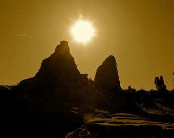 Desert Sun behind the rocks in AZ