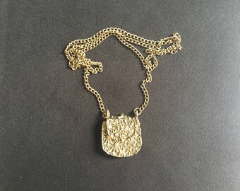 Long charm necklace can be made with metal chain bronze