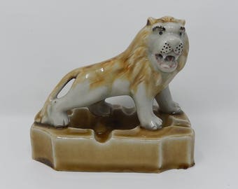 Old ashtray with roaring lion, free delivery