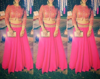 Hot pink embroidered blouse and skirt