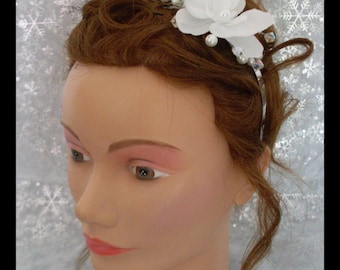 very nice headband with a white Orchid