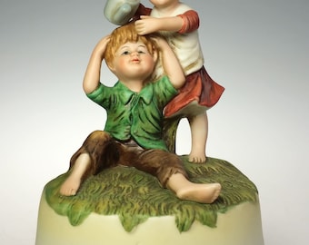Vintage Porcelain Music Box Little Girl Teasing Boy Raindrop Keep Falling Head