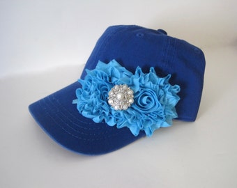 light blue fitted hat with pink brim