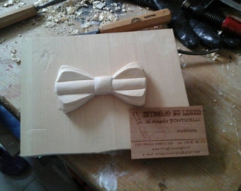 Wooden bow-tie made entirely by hand.