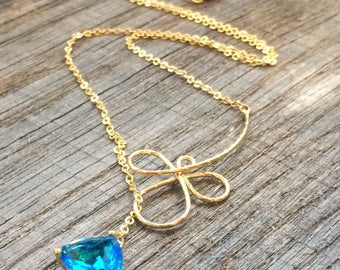 With wire plate flower lariat necklace gold and Sapphire Crystal glass