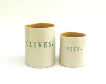olives and pits ... hand built porcelain containers ... vessels