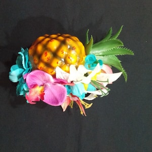 The Ashley! Pineapple fascinator with gorgeous orchids, lilies and blue flowers . Great for Viva pool party or Tiki Oasis!