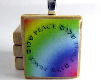 Circle of Peace - Shalom - Hebrew Scrabble tile pendant on rainbow background