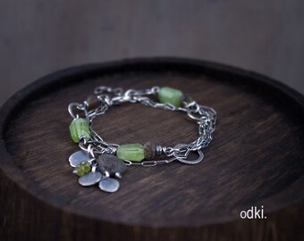 Raw Peridot and Baltic Amber Bracelet with Hand Hammered Sterling Silver Circles and Charms - Multi Strand Beaded Bracelet with Chain - odki