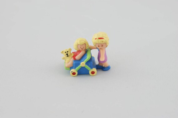 polly dolls pram