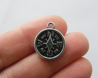4 Compass charms antique silver tone SC49