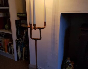 Floor standing candle holder