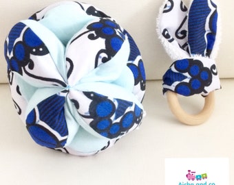 Duo gripping wax montessori ball blue white and his Bunny teething ring rattle