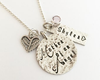 Memorial necklace hand stamped Mother of an Angel necklace with name swarovski crystal and heart wings charm. Loss of child charm keepsake