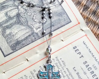 Vintage turqouise cross pendant necklace .