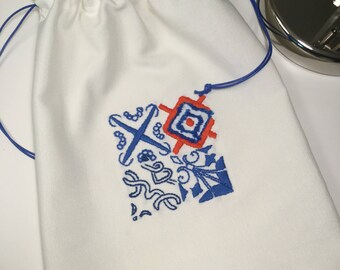 Embroidered azulejos EnchDK hand clutch