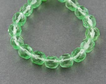 2 Strands of Translucent 6 mm Faceted Round Glass Beads - Pale Green (1255)